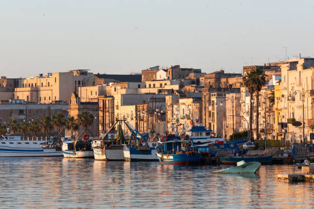 Sea port. Ships and boats at dawn. Sea town. Taranto stock photo