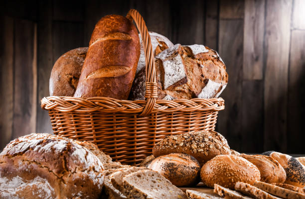 istock Assorted bakery products including loafs of bread and rolls 1353190933