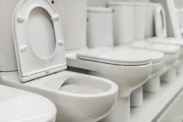 istock Flush toilets put up for sale in a store 1353192257