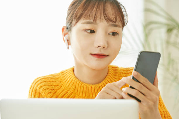 istock A young Asian woman working at home 1353194848