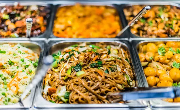 Photo of Asian food sold in a shopping mall food court