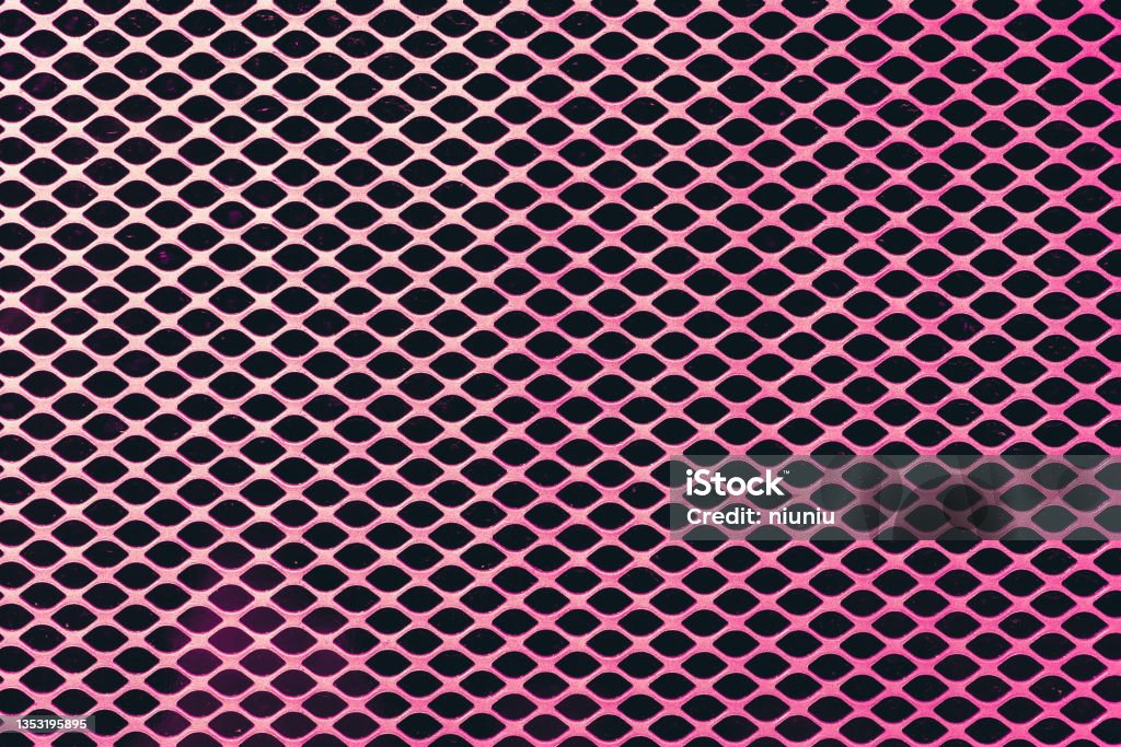 Metal mesh texture. Take the gradient pink mesh texture as the background. Metal Grate Stock Photo