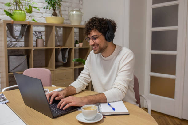 istock A young businessman is working on a laptop 1353199618