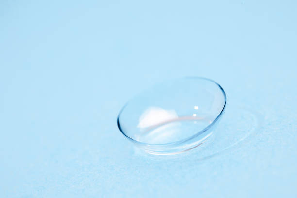 istock contact lenses on blue background close up view 1353200880