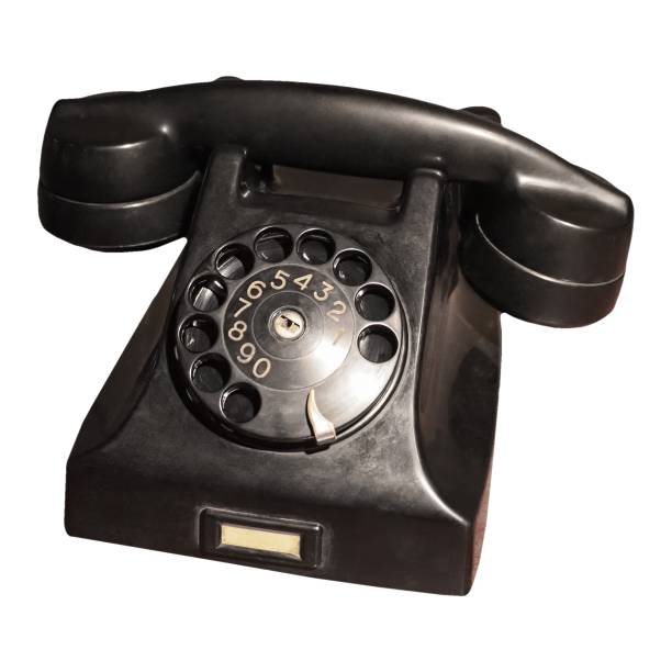 istock vintage rotary dial phone isolated over white 1353204568