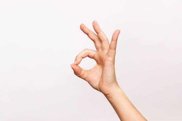 istock Female hand showing the ok gesture 1353205313