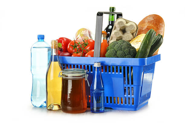 istock Composition with groceries in shopping basket isolated on white 135320685