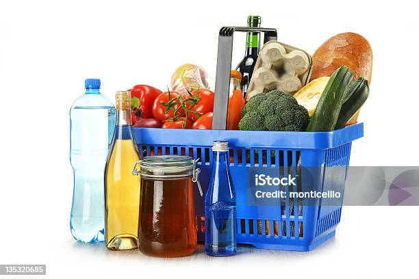 Composition With Groceries In Shopping Basket Isolated On White Stock Photo - Download Image Now