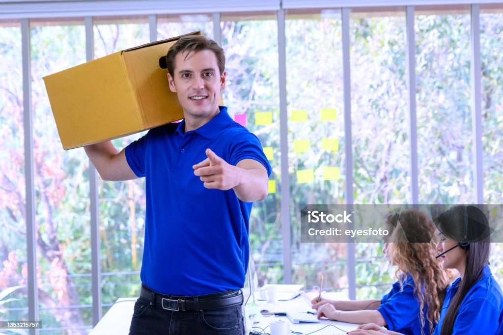 Delivery man service. Delivery man service. He work for transport company. Delivery product to customer. Service business and online shopping. Delivery Person Stock Photo