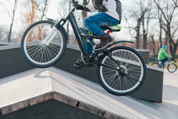 istock Boy Riding Bikes In The Skate Park 1353216441