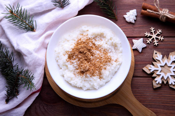 istock Christmas rice pudding with cinnamon on a wooden background 1353218459