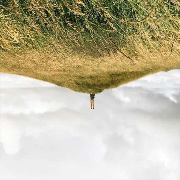 Holding on to the world. Afraid of letting go.