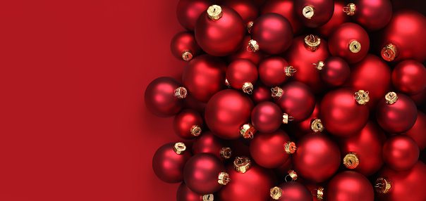 Christmas ornaments on red background, new year concept. Digitally generated image.