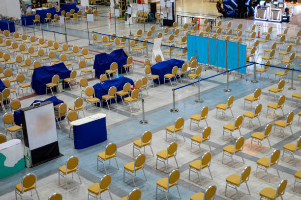 istock Arrange chair pattern waiting get vaccine of COVID19 1353219364