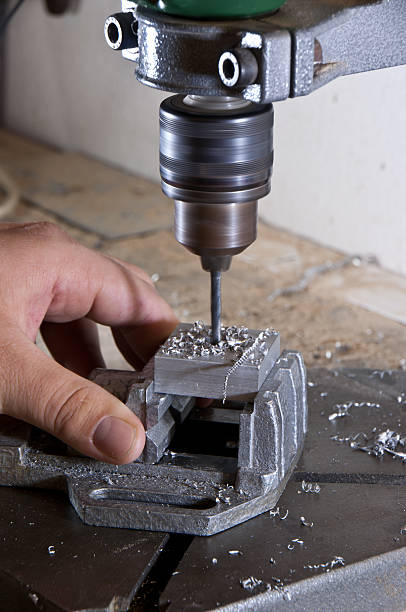 istock Drilling into a block of metal 135322004
