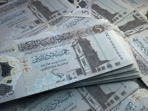 Money of Libya. Libyan dinar bills. LYD banknotes. 5 dinars. Business, finance, news background.