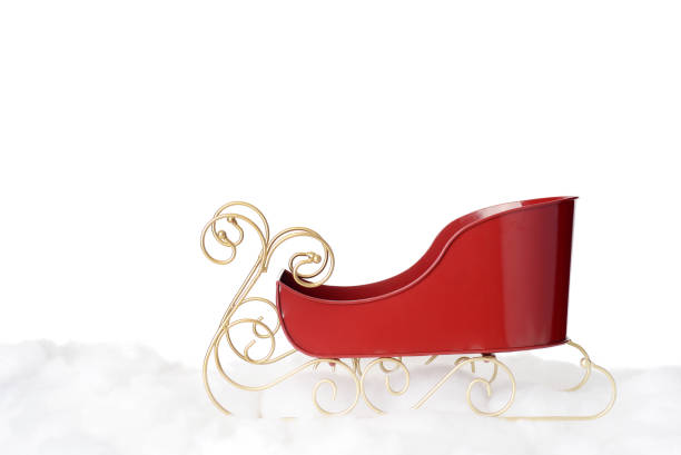 istock red metal santa sleigh on snow 1353223360