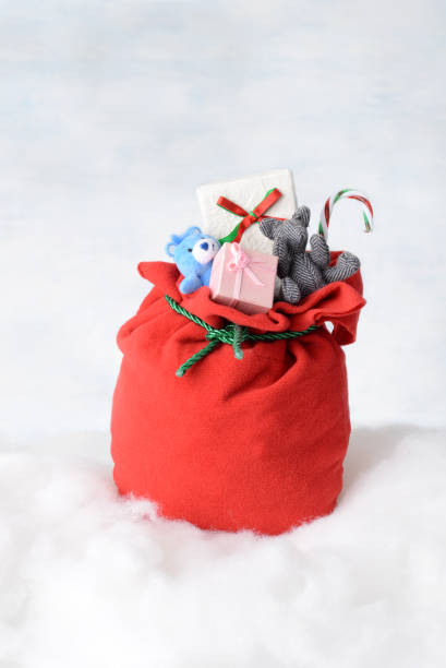 istock red santa sleigh with presents 1353223373