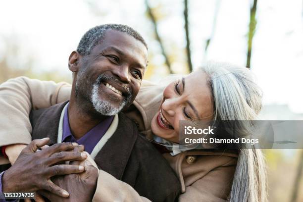 Storytelling Image Of A Multiethnic Senior Couple In Love Stock Photo - Download Image Now