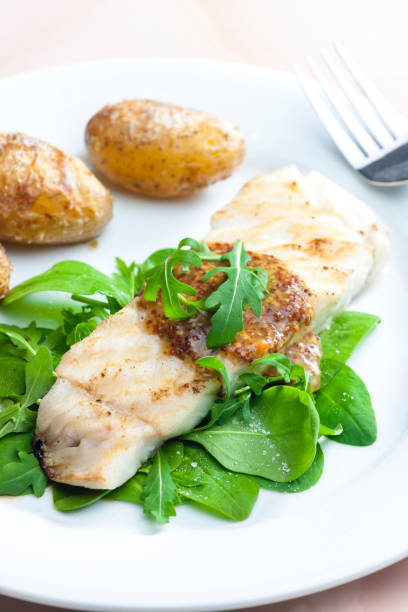 istock grilled carp with mustard sauce and grilled potatoes 1353226137