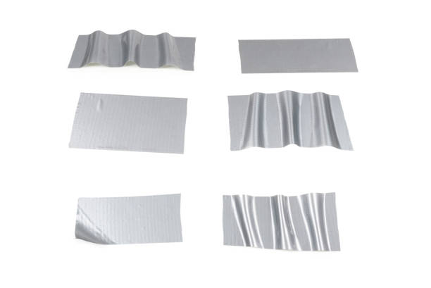 istock Silver scotch tape pieces isolated on white background. 1353227804