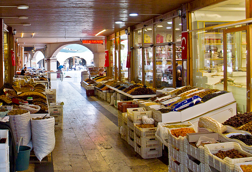 Malatya, Turkey - July 18, 2021: View of sire bazaar (şire pazarı). People buy Turkish sucuk wallnut apricot delight oriental sweets dried fruits and nuts in malatya Turkey.