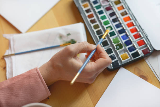 istock woman artist at work 1353230462