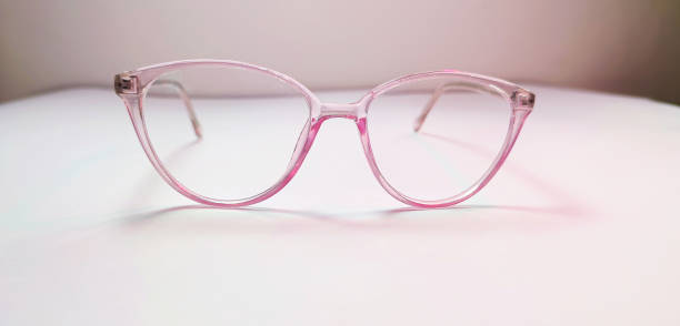 istock Eyeglasses with transparent purple frames. 1353232572