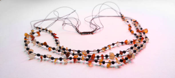 istock Elegant simple necklace on white background. 1353232574