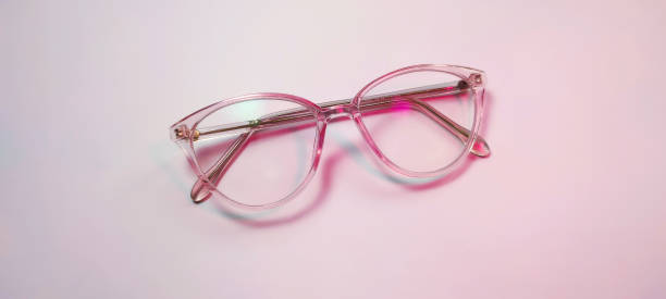 istock Eyeglasses with transparent purple frames. 1353232584