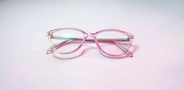 istock Eyeglasses with transparent purple frames. 1353232897