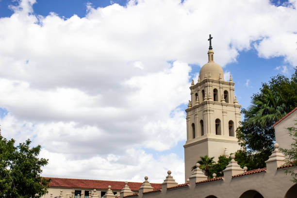 istock Spanish Style Church Tower With Dome And Cross 1353233092