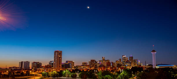 istock Night sky over Denver Colorado with moon 1353233108