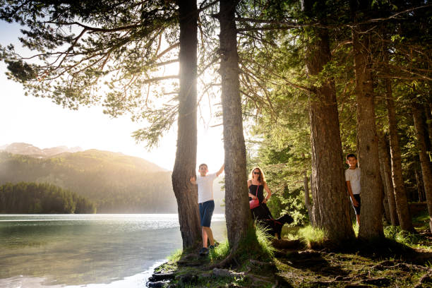 istock Mom and two boys in the mountains 1353233772