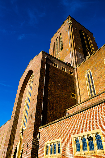 The Cathedral Church of the Holy Spirit, Guildford, commonly known as Guildford Cathedral, is the Anglican cathedral at Guildford, Surrey, England. Richard Onslow donated the first 6 acres of land on which the cathedral stands, with Viscount Bennett, a former Prime Minister of Canada, purchasing the remaining land and donating it to the cathedral in 1947. Designed by Edward Maufe and built between 1936 and 1961, it is the seat of the Bishop of Guildford.
