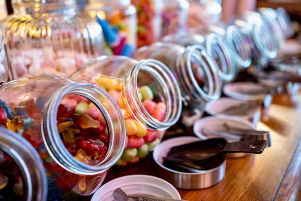 Candy Bar  or Candybar Candy Bar at Wedding with lots of sweets gum drop photos stock pictures, royalty-free photos & images