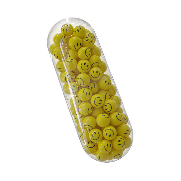 renderizado 3d de bolas felices amarillas en cápsula aislado sobre fondo blanco - happy pills concept - ilustración 3d - musgo apretado fotografías e imágenes de stock