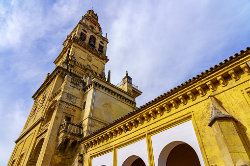 Bell tower of the mosque of Cordoba in Spain in sunny and colorful day.