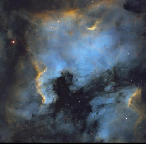 The North America Nebula is a large emission nebula located in the vicinity of Deneb, the brightest star in Cygnus.