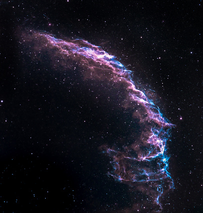 NGC 6992 - The Eastern Veil Nebula The Veil Nebula is a cloud of heated and ionized gas and dust in the constellation Cygnus.