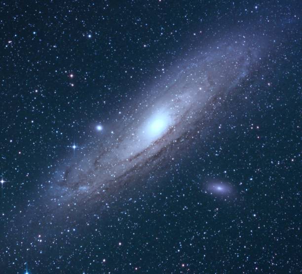 Andromeda Galaxy or M31 The Andromeda Galaxy, also known as Messier 31, M31, or NGC 224 and originally the Andromeda Nebula, is a barred spiral galaxy approximately 2.5 million light-years from Earth and the nearest large galaxy to the Milky Way hubble space telescope photos stock pictures, royalty-free photos & images