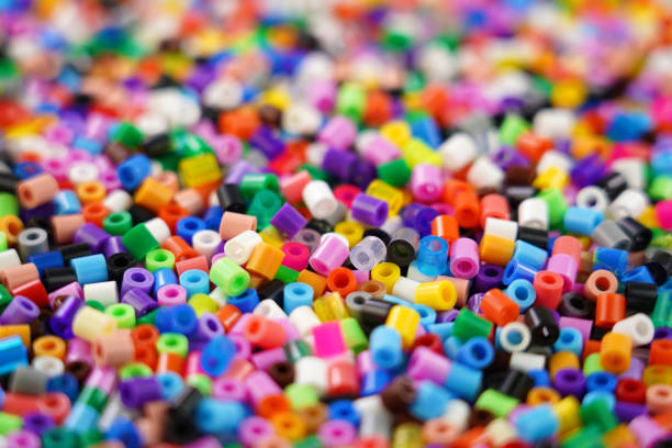 istock Multicolored plastic beads toy for kids . 1353244217