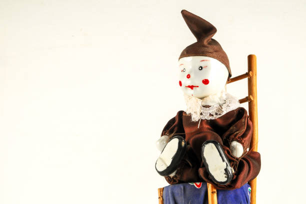 istock Pierrot toy doll on white background 1353245055