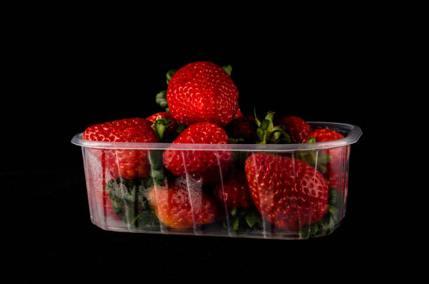 istock fresh strawberries in box isolated 1353245107