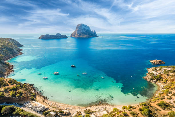 Aerial view of Cala d’Hort, Ibiza Aerial view of Cala d"u2019Hort, Ibiza islands, Spain balearic islands stock pictures, royalty-free photos & images