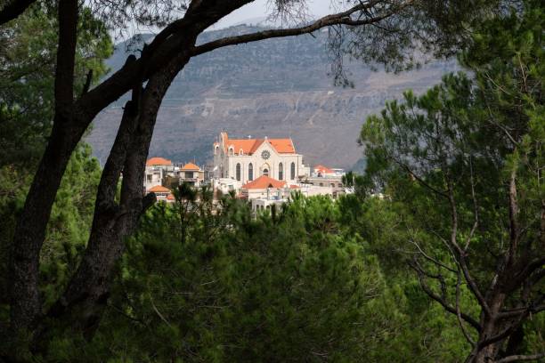 Aerial Panoramic view of Our Lady of Lebanon Maronite shrine over top of Harissa Mountain of Jouthe Jounieh bay, in Lebanon, Middle East
