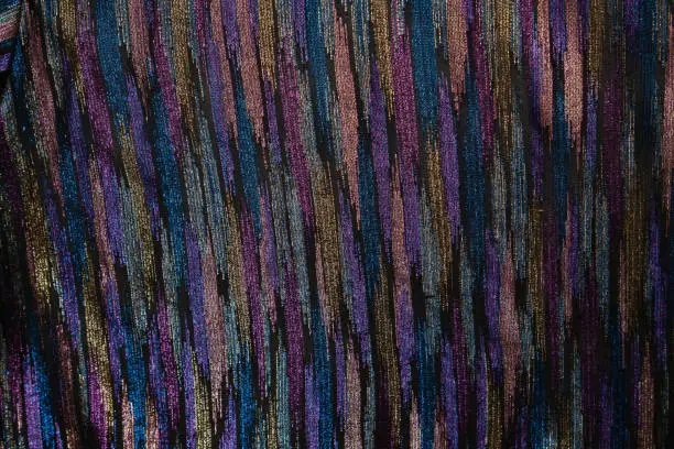 Photo of Interesting texture of shiny fabric. Northern Lights