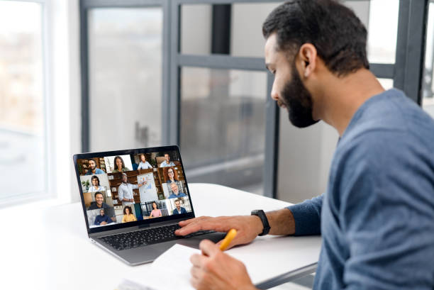istock View from back above shoulder on the laptop with diverse employees 1353259403