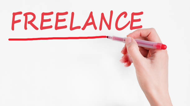 istock hand writing inscription freelance with marker, concept, stock image 1353268448
