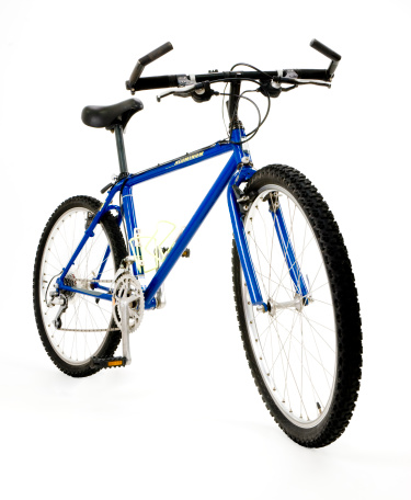 Mountain bike shot at a low angle and isolated on a white background.